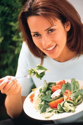 Womean Eating Salad